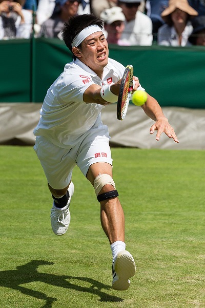 A tennis player hitting a ball